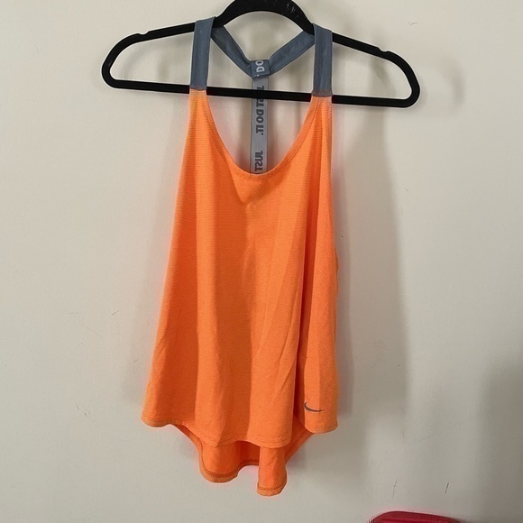 Nike Tops - Nike Neon Orange Racerback Tank Top Women Medium 
Condition 7/10 no flaws